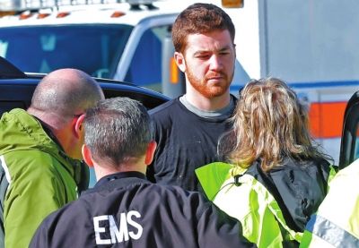 嫌犯接受詢問。新華社/美聯