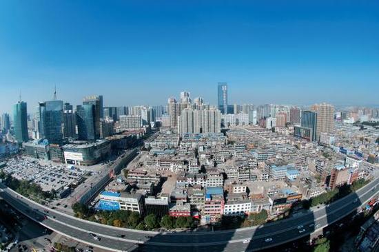 經(jīng)過4個(gè)多月的推進(jìn)，親賢社區(qū)的拆遷工作進(jìn)展緩慢，原定于2015年10月底完成的拆遷，在10月中旬時(shí)仍停留在對部分住戶進(jìn)行插花式拆除。(拍攝：2015年10月16日)