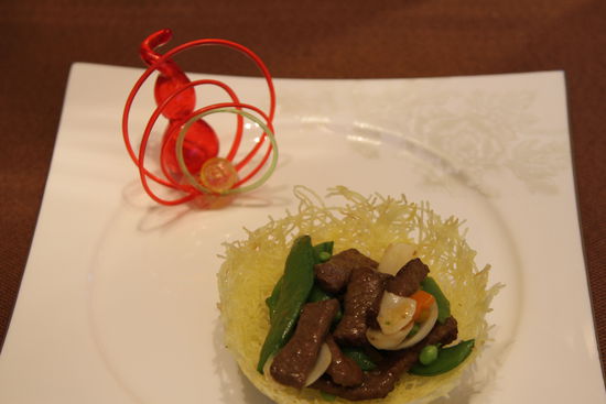 雀巢爆羊柳。 花惠生 供圖