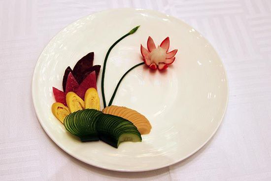 迎賓冷盤“洋花蘿卜”。 花惠生 供圖